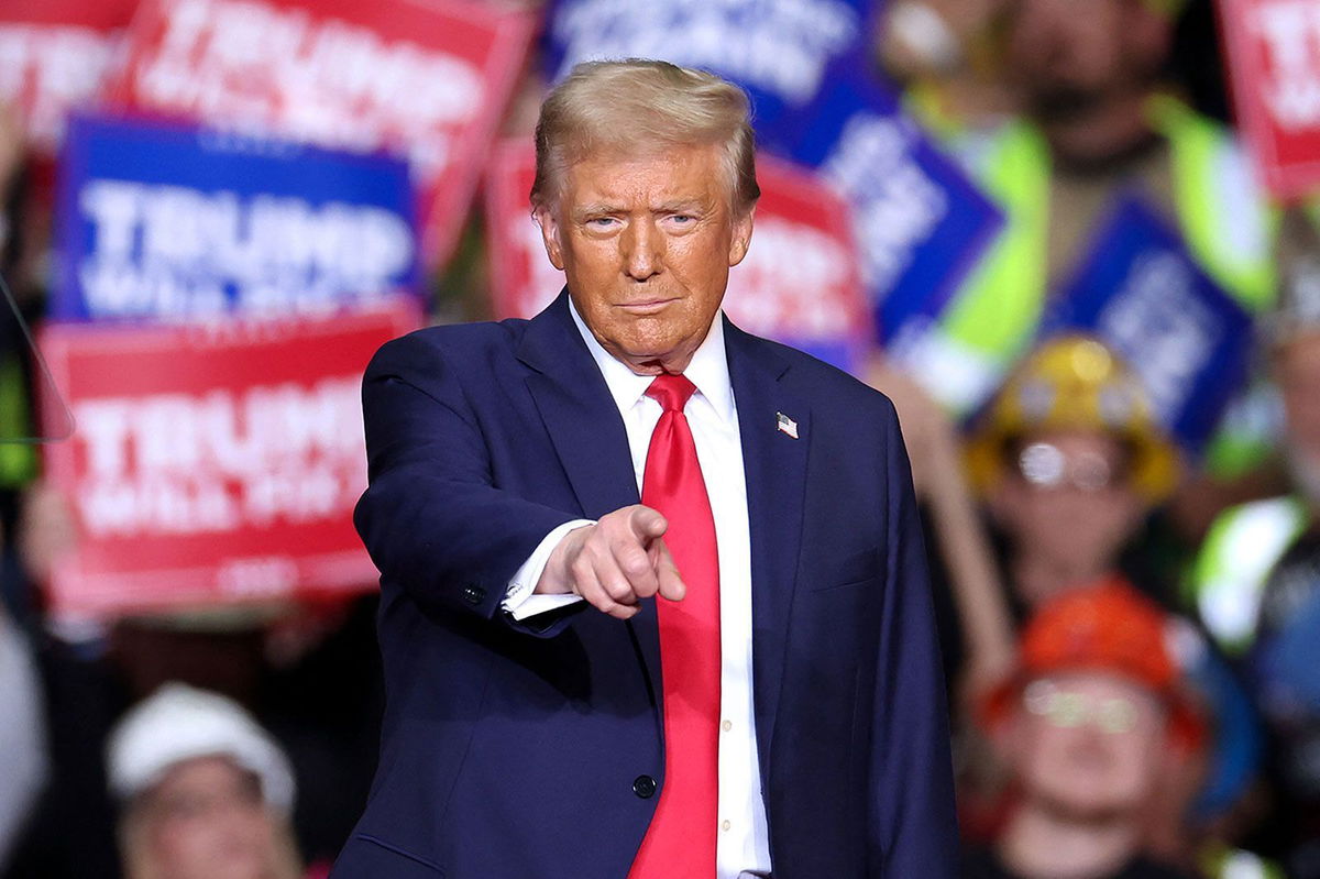 <i>Charly Triballeau/AFP/Getty Images via CNN Newsource</i><br/>Former President Donald Trump gestures during a campaign rally in Pittsburgh