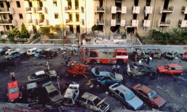 Burned cars are seen the day after a bomb attack that killed judge Paolo Borsellino and his police guards in Palermo July 20