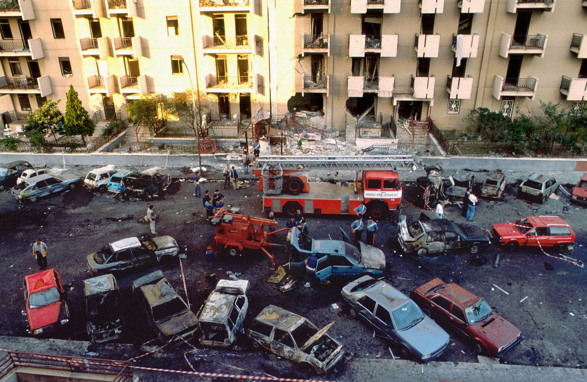 <i>Tony Gentile/Reuters via CNN Newsource</i><br/>Burned cars are seen the day after a bomb attack that killed judge Paolo Borsellino and his police guards in Palermo July 20