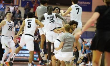 Colorado players celebrate their win at the Maui Invitational.