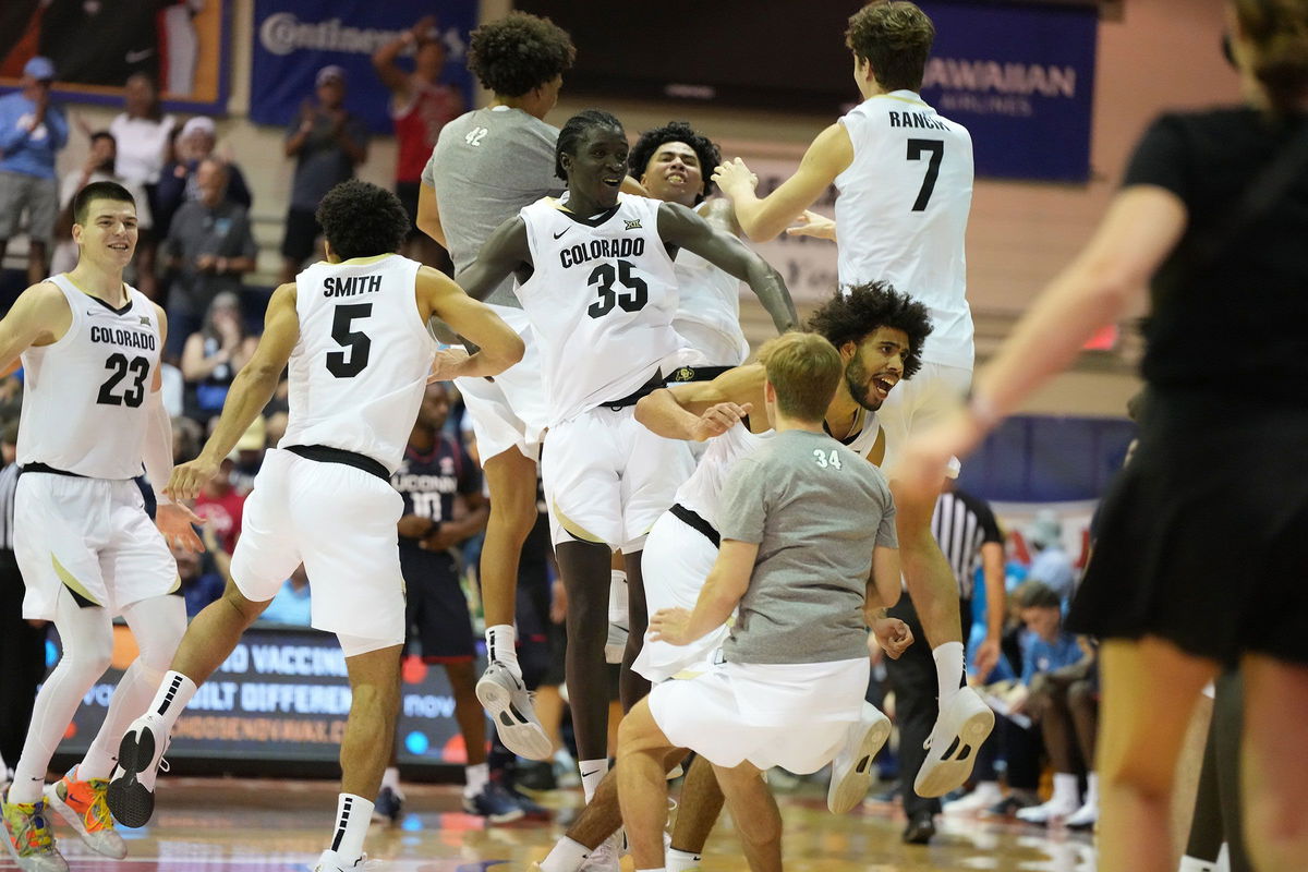 <i>Mitchell Layton/Getty Images via CNN Newsource</i><br/>Colorado players celebrate their win at the Maui Invitational.