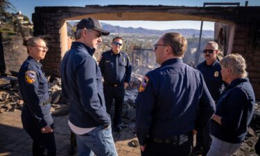 California Gov. Gavin Newsom checks out fire damage.