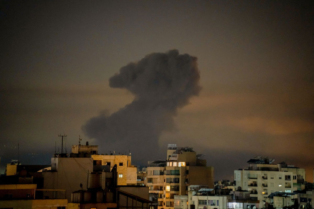 <i>Nael Chahine/AFP/Middle East Images/Getty Images via CNN Newsource</i><br/>Smoke rises after an Israeli airstrike has struck the southern suburbs of Beirut on November 9.