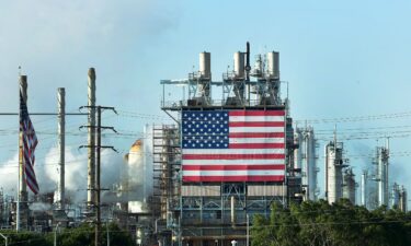 The US flag on display at the Wilmington Oil Fields south of Los Angeles