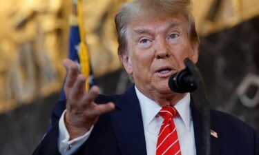 Donald Trump talks to reporters at the International Brotherhood of Teamsters headquarters in Washington