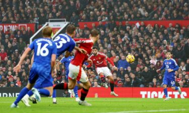 Manchester United's Bruno Fernandes scores the team's first goal against Leicester City.