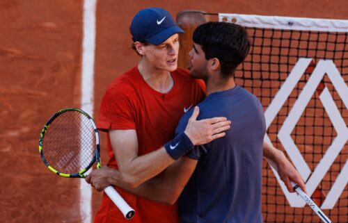 Alcaraz and Sinner shake hands after the former's victory in the French Open semifinals.