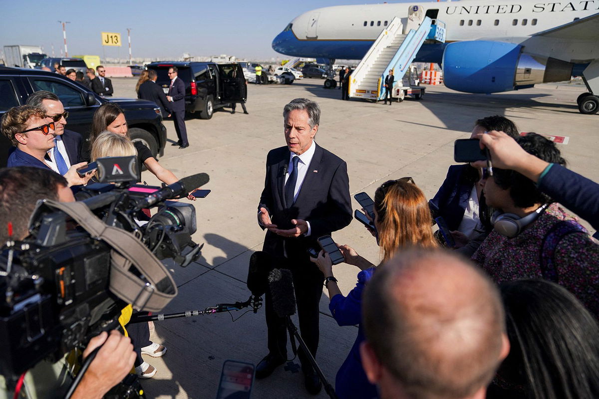 <i>Nathan Howard/Pool/Reuters via CNN Newsource</i><br/>Secretary of State Antony Blinken speaks with members of the media at Ben Gurion International Airport in Tel Aviv