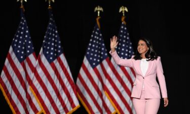 Tulsi Gabbard greets the crowd before speaking during a campaign rally in Las Vegas