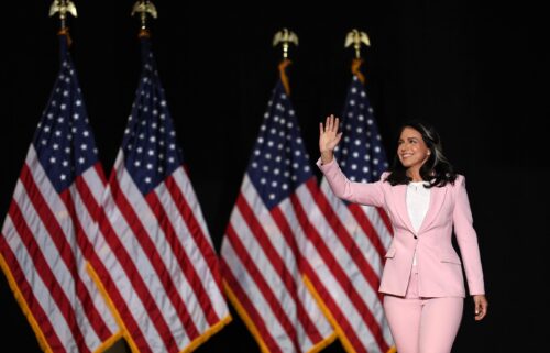 Tulsi Gabbard greets the crowd before speaking during a campaign rally in Las Vegas