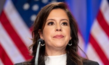 Rep. Elise Stefanik is seated before President-elect Donald Trump arrives at a meeting of the House GOP conference on November 13 in Washington.