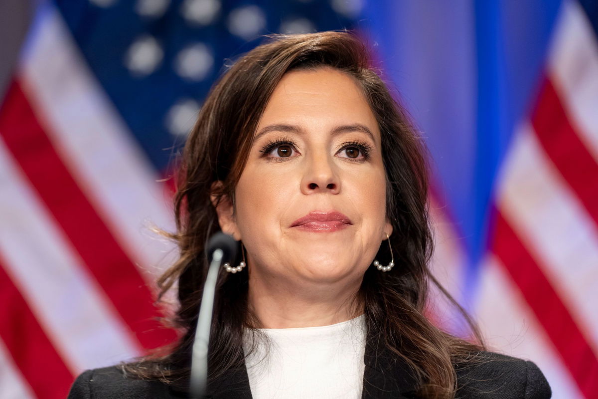 <i>Alex Brandon/AP via CNN Newsource</i><br/>Rep. Elise Stefanik is seated before President-elect Donald Trump arrives at a meeting of the House GOP conference on November 13 in Washington.