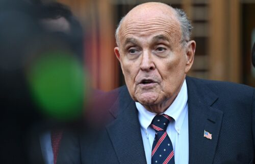 Former New York City Mayor Rudy Giuliani seen speaking to members of the press after appearing in federal court in New York on November 7.