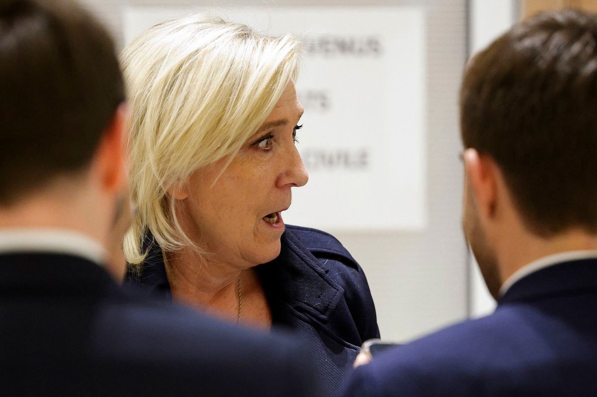 <i>Geoffroy van der Hasselt/AFP/Getty Images via CNN Newsource</i><br/>Le Pen outside the courtroom on Wednesday