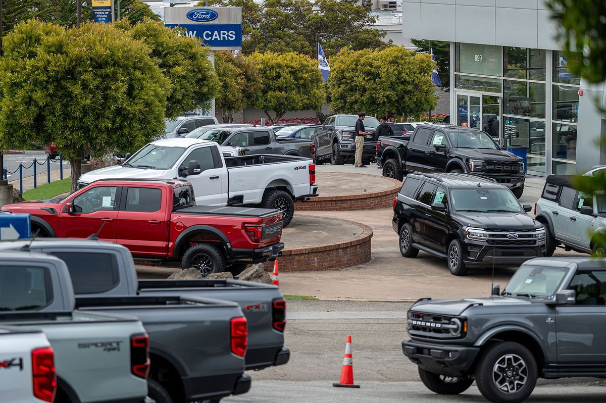 <i>David Paul Morris/Bloomberg/Getty Images via CNN Newsource</i><br/>Pictured are new Ford vehicles for sale at a dealership in Colma