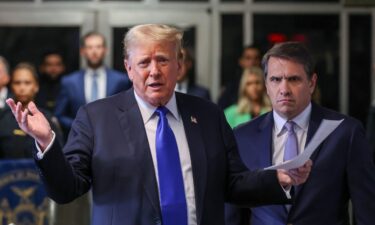 Former President Donald Trump speaks alongside his attorney Todd Blanche as he arrives for his hush money trial at Manhattan Criminal Court on May 30 in New York City.