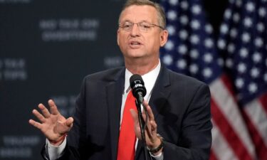 Former Rep. Doug Collins speaks before Republican presidential nominee former President Donald Trump at a campaign event at the Cobb Energy Performing Arts Centre