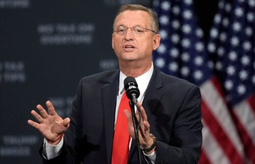 Former Rep. Doug Collins speaks before Republican presidential nominee former President Donald Trump at a campaign event at the Cobb Energy Performing Arts Centre