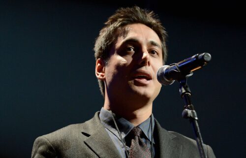 Iranian activist Kianoosh Sanjari speaks on stage at the Amnesty International Concert presented by the CBGB Festival at Barclays Center in New York City