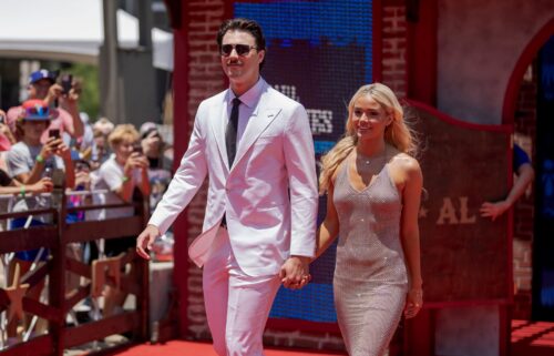 Paul Skenes and Livvy Dunne pose for a photo during the 2024 All-Star Red Carpet Show in Arlington