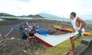 Hundreds of thousands of people were evacuated from their homes as others made preparations for the typhoon ahead of its landfall on Saturday.