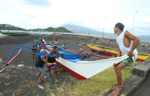 Hundreds of thousands of people were evacuated from their homes as others made preparations for the typhoon ahead of its landfall on Saturday.