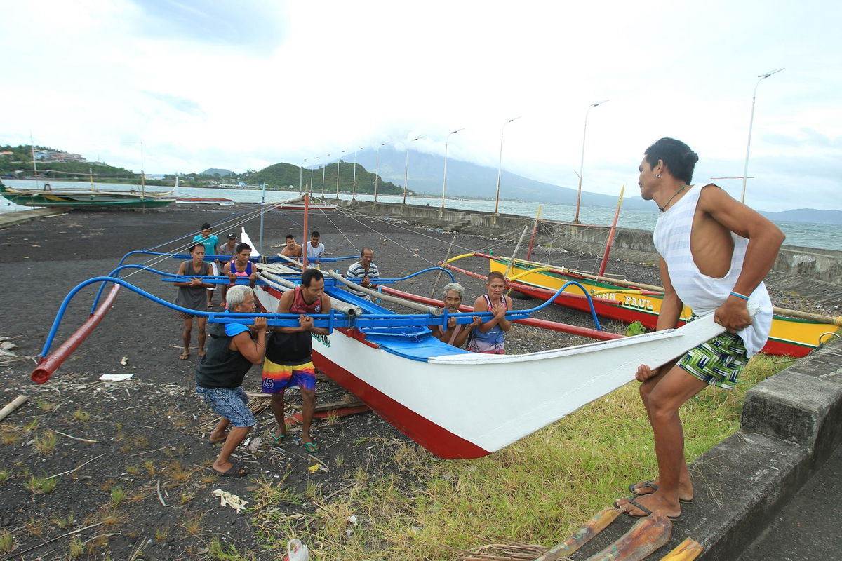 <i>Charism Sayat/AFP/Getty Images via CNN Newsource</i><br/>Hundreds of thousands of people were evacuated from their homes as others made preparations for the typhoon ahead of its landfall on Saturday.