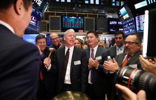 This 2018 photo shows Chris Wright ringing a ceremonial bell on the floor of the New York Stock Exchange shortly after the opening bell in New York.