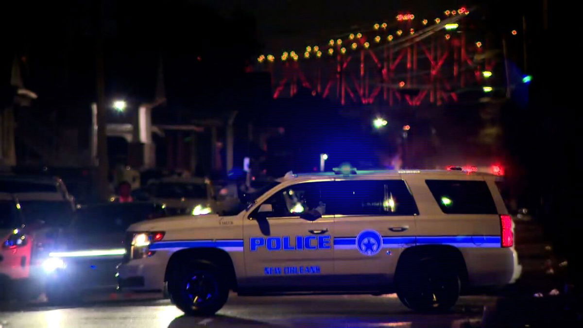 <i>WDSU via CNN Newsource</i><br/>Police respond to the scene of a shooting in New Orleans on November 17.  Two people were killed and 10 others were injured in two shootings during a popular New Orleans second-line parade on Sunday.