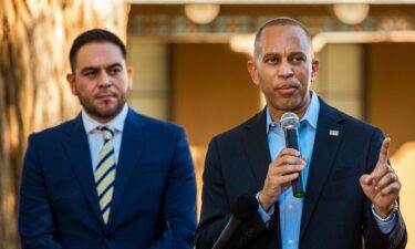 Rep. Gabe Vasquez watches as Jeffries speaks during a news conference in Albuquerque