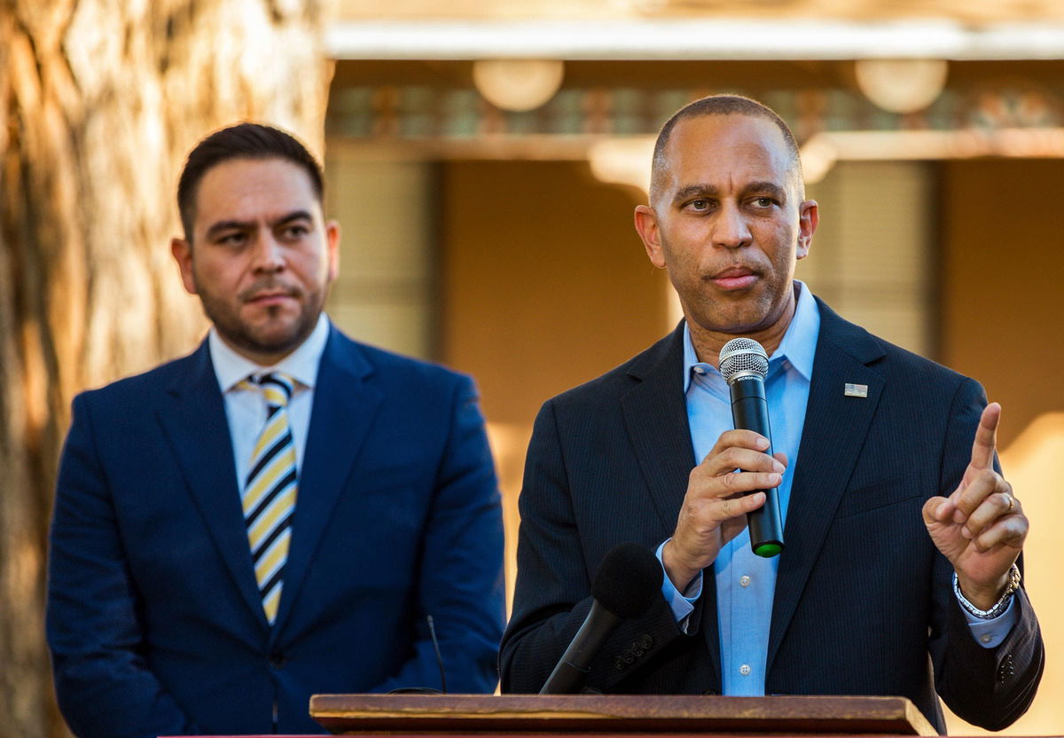 <i>Anna Padilla/Bloomberg/Getty Images via CNN Newsource</i><br/>Rep. Gabe Vasquez watches as Jeffries speaks during a news conference in Albuquerque