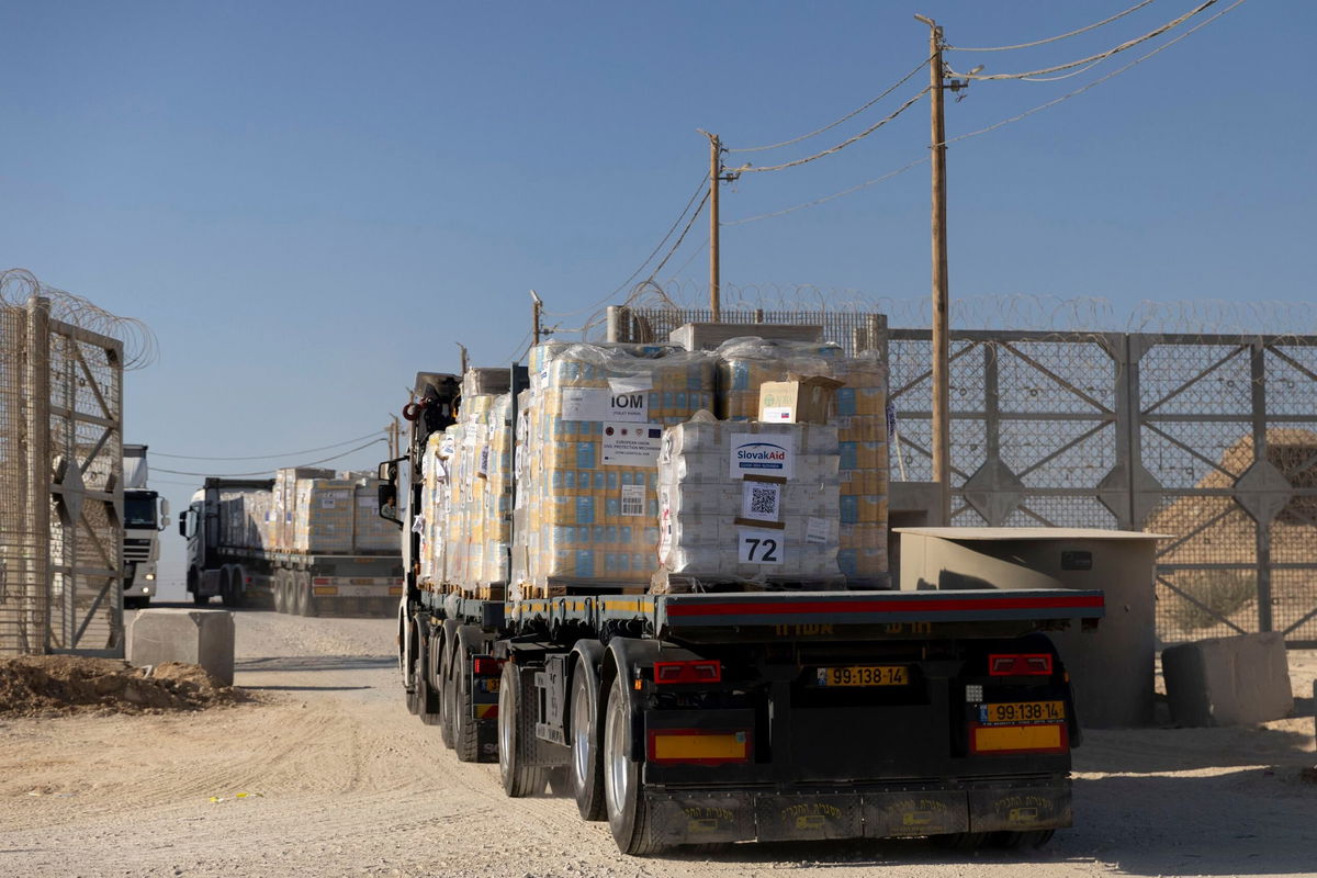 <i>Amir Levy/Getty Images Europe/Getty Images via CNN Newsource</i><br/>Trucks carrying humanitarian aid cross into the Gaza Strip on November 11 at the Erez Crossing.