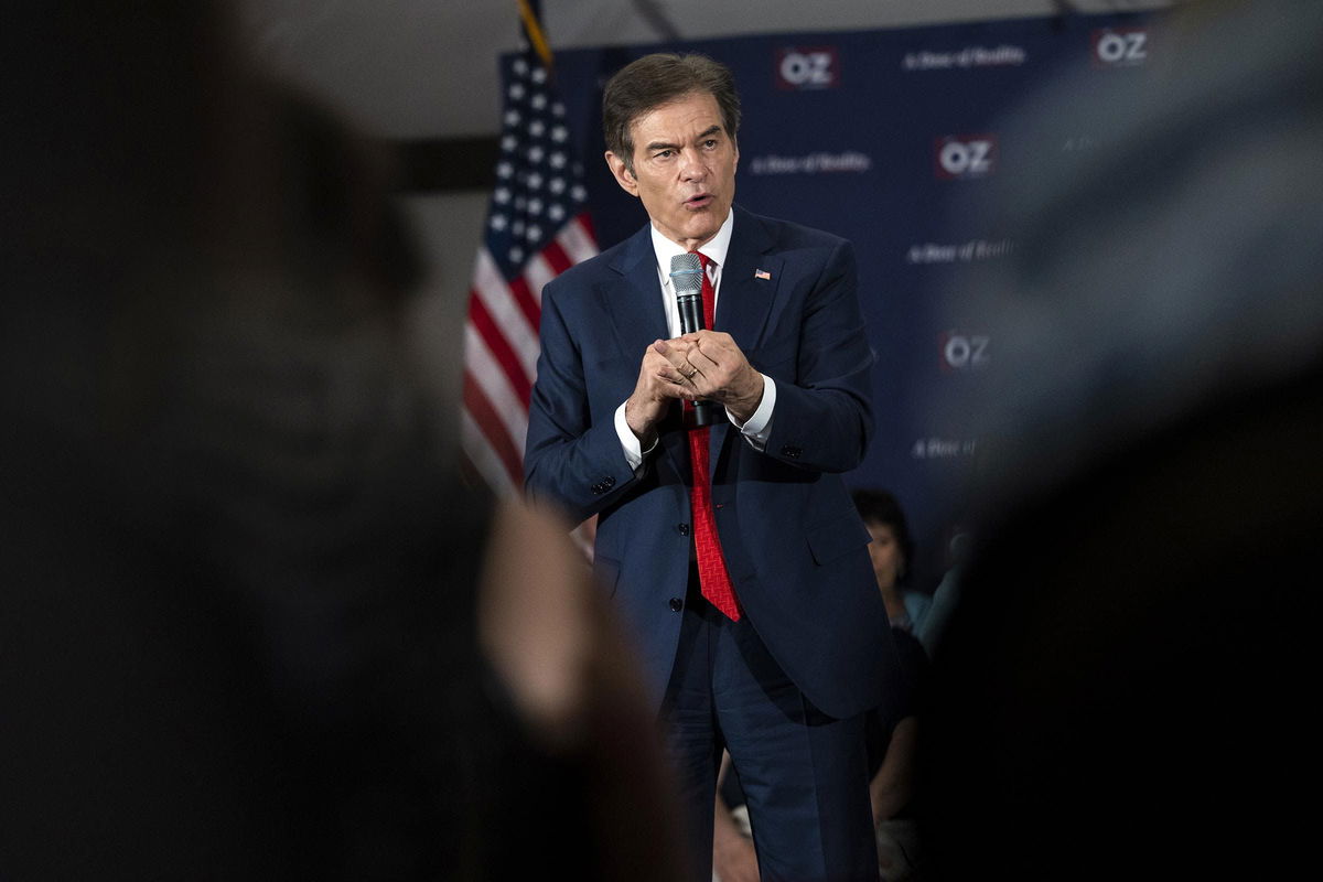 <i>Rachel Wisniewski/Bloomberg/Getty Images via CNN Newsource</i><br/>Mehmet Oz speaks during a town hall in Bell Blue