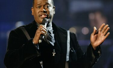 Singer Luther Vandross sings former Beatle George Harrison's song "My Sweet Lord" during a tribute to Harrison and other artists during a reflective moment at the 29th annual American Music Awards in Los Angeles January 9