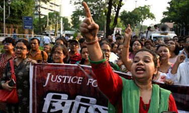 Activists and medical professionals shout slogans as they take part in a protest march to condemn the rape and murder of a doctor in Kolkata on September 20.