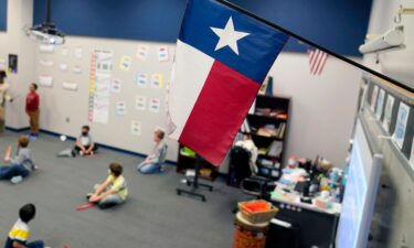 A Texas flag is displayed in an elementary school in Murphy