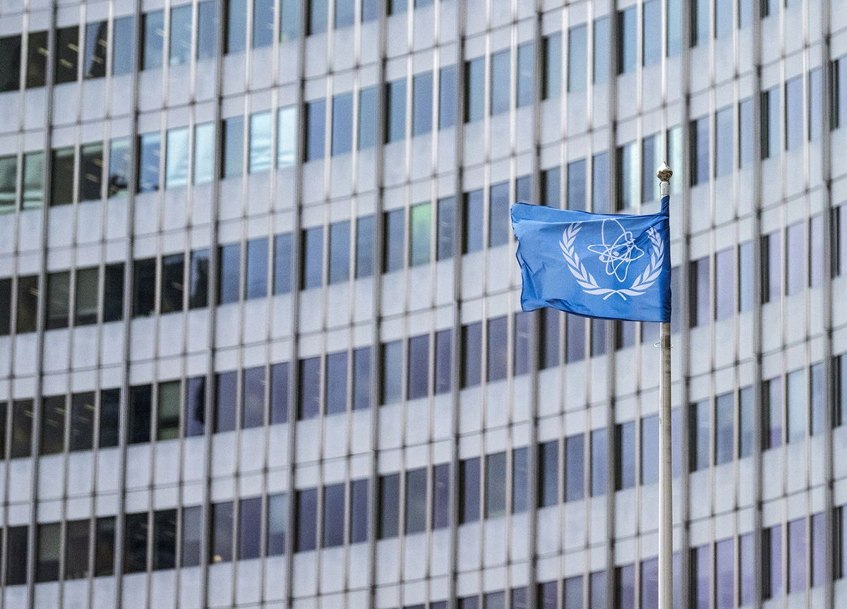 <i>Joe Klamar/AFP/Getty Images via CNN Newsource</i><br/>The IAEA flag flutters in the wind outside of the IAEA headquarters during the International Atomic Energy Agency IAEA's Board of Governors meeting at the agency's headquarters in Vienna