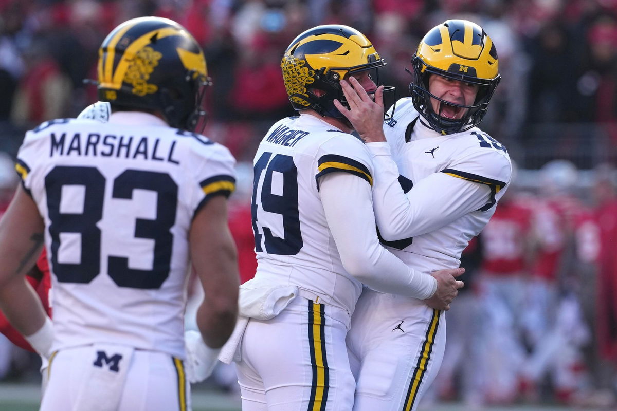 <i>Jason Mowry/Getty Images via CNN Newsource</i><br/>Michigan celebrates go-ahead field goal against Ohio State.