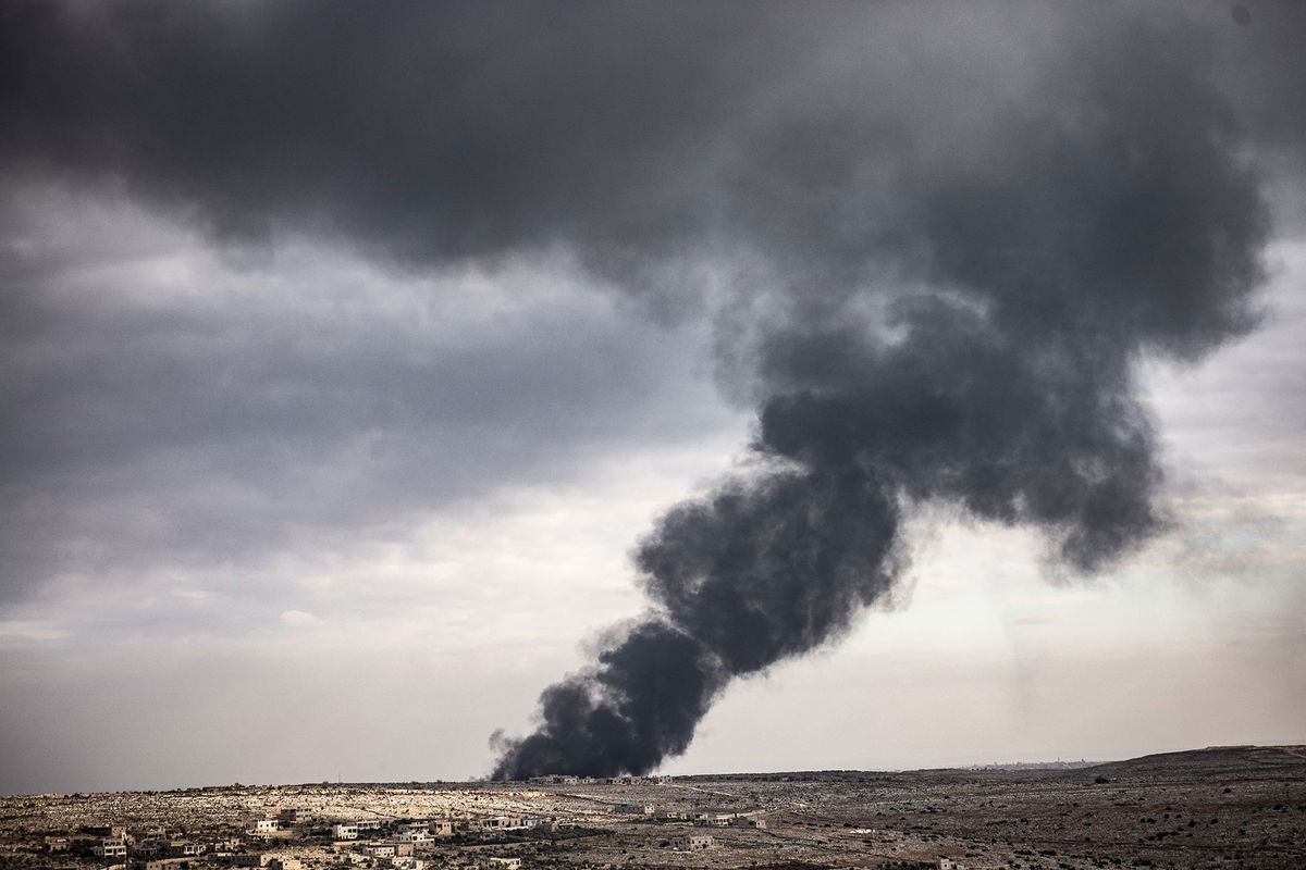 <i>Anas Alkharboutli/picture alliance/Getty Images via CNN Newsource</i><br/>Smoke rises from clashes between Syrian rebels and the regime in the Aleppo countryside on Wednesday.