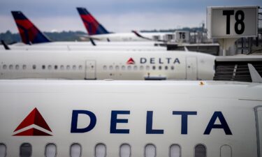 A stowaway flew aboard a Delta Air Lines flight from New York to Paris Tuesday evening amid the Thanksgiving travel surge