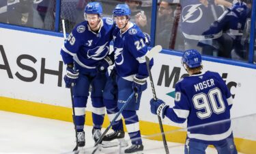 Brayden Point (center) celebrates scoring against the Washington Capitals.