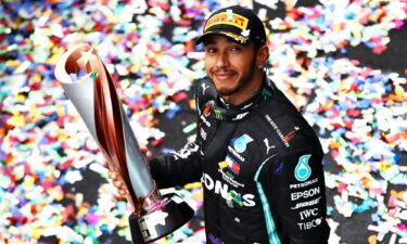 Hamilton toasts his seventh drivers' championship triumph after winning in Istanbul in 2020.