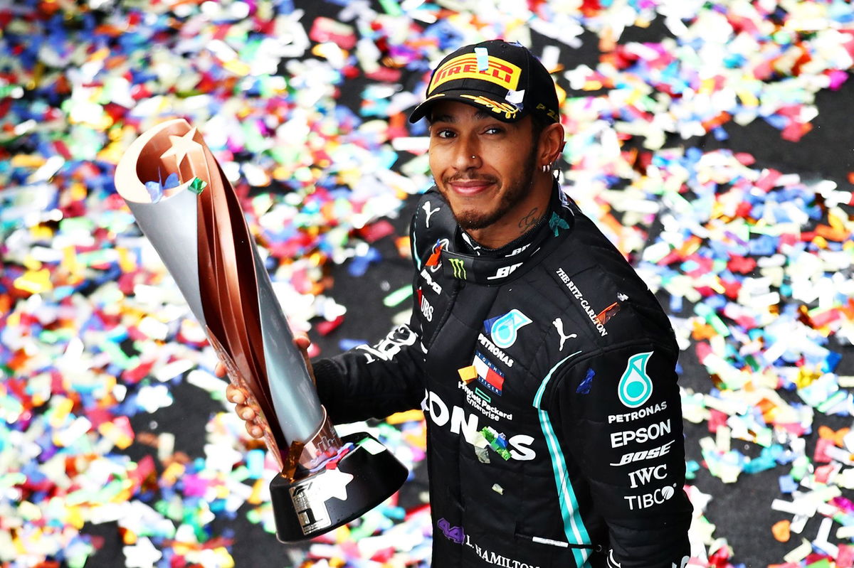 <i>Bryn Lennon/Getty Images via CNN Newsource</i><br/>Hamilton toasts his seventh drivers' championship triumph after winning in Istanbul in 2020.