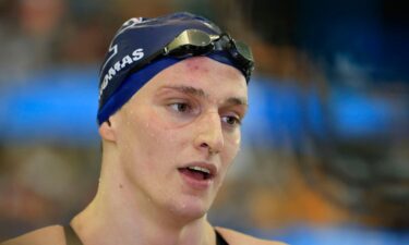 Transgender woman Lia Thomas of the University of Pennsylvania talks to a reporter after winning the 500-yard freestyle at the NCAA Division I Women's Swimming & Diving Championshipon on March 17