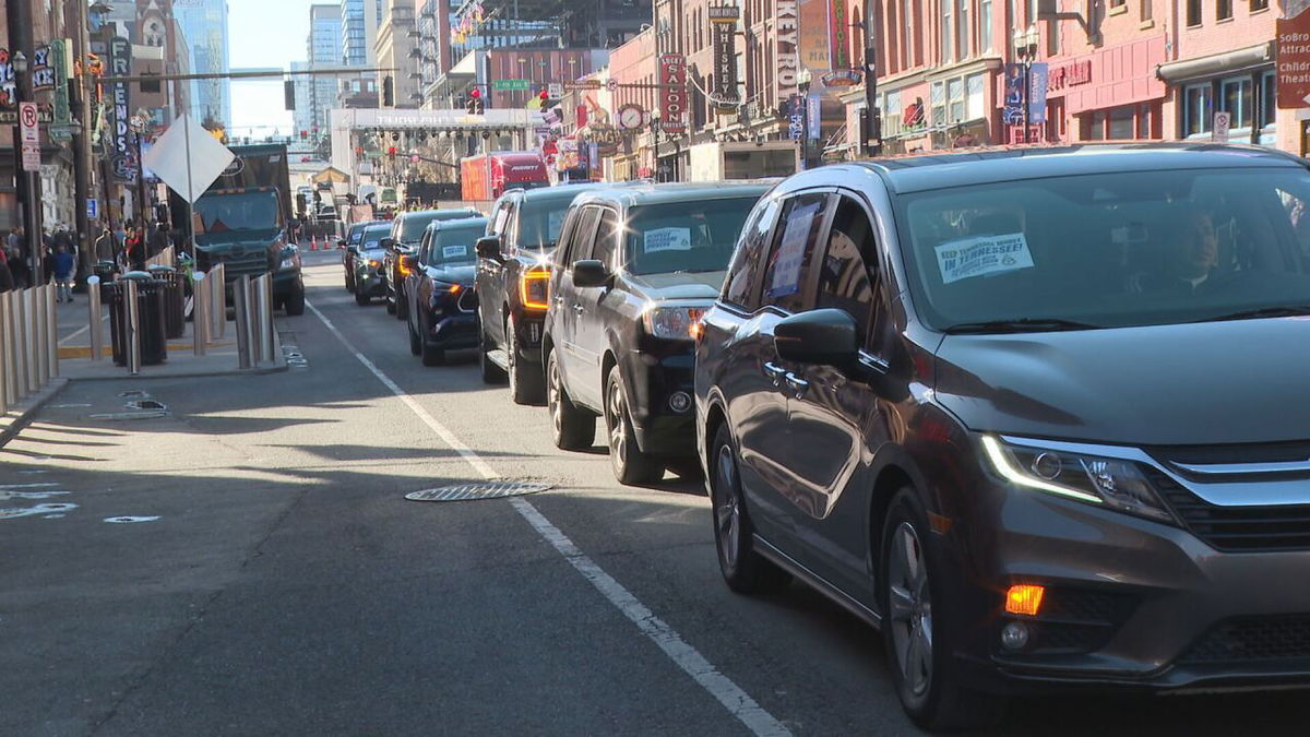 <i>WTVF via CNN Newsource</i><br/>Rideshare drivers drove in a loop around downtown during CMA Award activities.