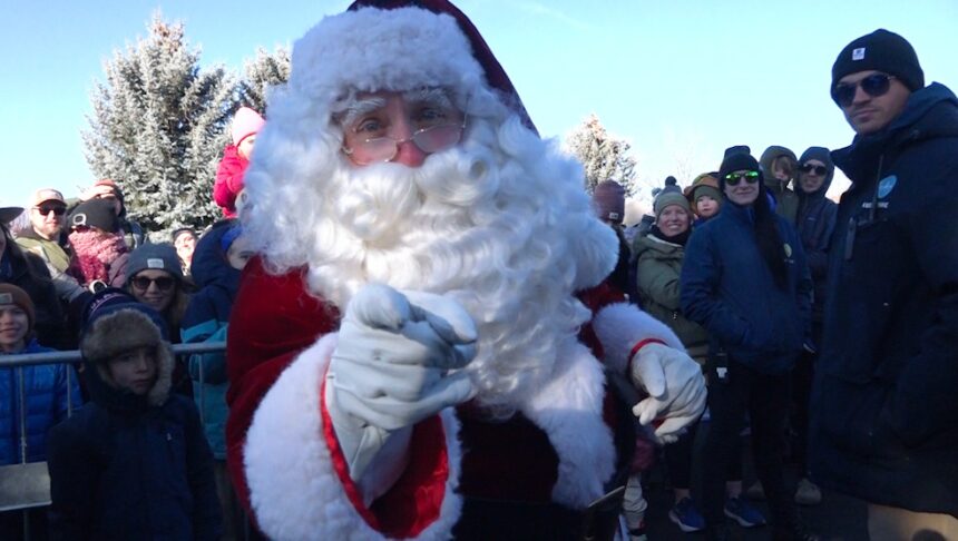 Santa arrives in the Old Mill District by helicopter to kick off the start of 'Santaland.'