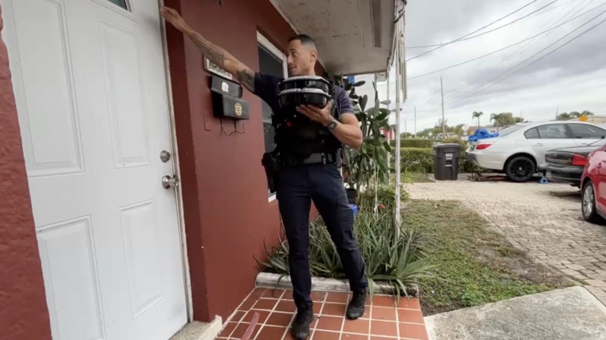 <i>WPTV via CNN Newsource</i><br/>West Palm Beach officers and volunteers hand-delivered 150 hot meals to homebound seniors on Christmas morning.