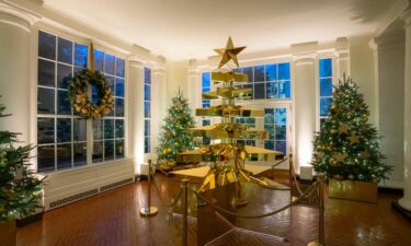 The first Christmas tree display featured on the White House tour is dedicated to Gold Star Families. This year’s Gold Star Tree exhibit is constructed of six oversized and stacked stars