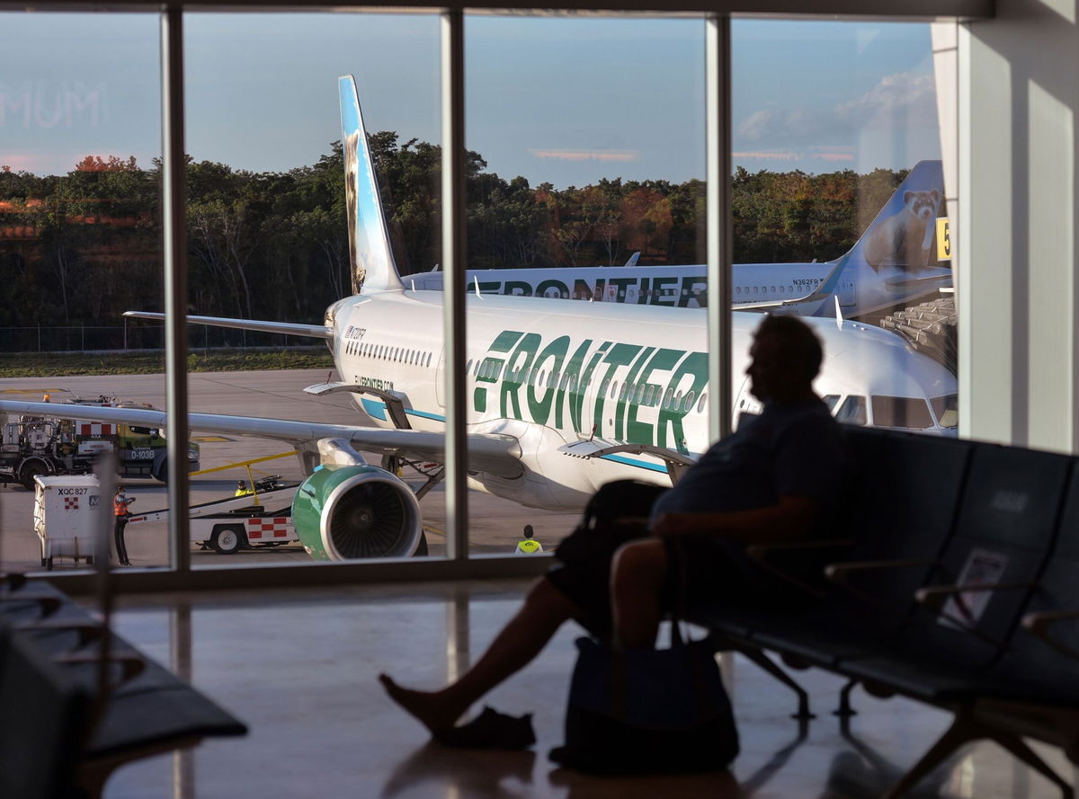 <i>Artur Widak/NurPhoto/AP via CNN Newsource</i><br/>A Frontier Airlines plane sits on the tarmac at Cancun International Airport in Mexico. Frontier Airlines is the latest no-frills carrier getting into the premium seating game — with what it’s referring to as “first class-style” seats.