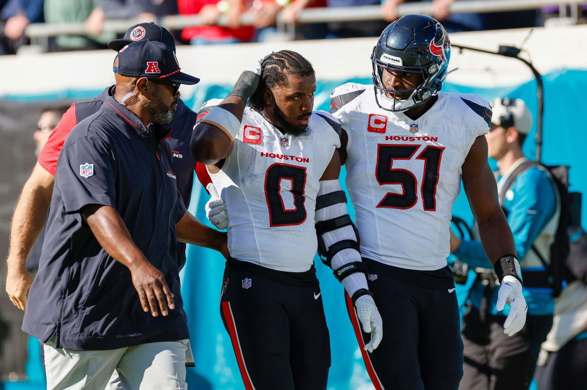 <i>David Rosenblum/Icon Sportswire/Getty Images via CNN Newsource</i><br/>Houston Texans linebacker Azeez Al-Shaair (No. 0) was escorted off the field after being ejected from Sunday's game against the Jacksonville Jaguars